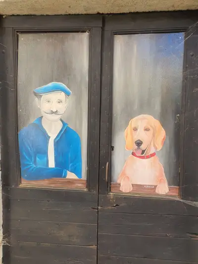 peinture d'un homme et de son chien