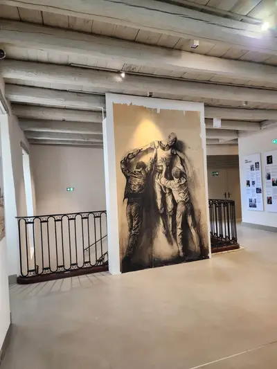 Présentation du collage représentant Jean Genet par Ernest Pignon au Doyenné à Brioude