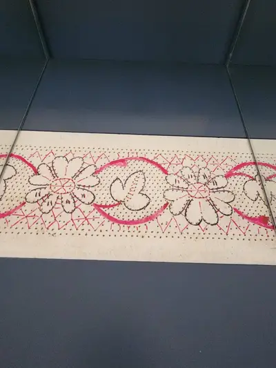Dessin de dentelle au musée de Retournac